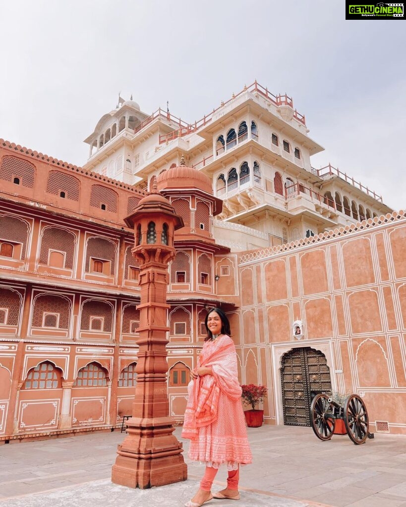 Anupama Gowda Instagram - Jaipur 🌸 1. City palace Every inch of this palace is mesmerising 💓 Love it Love it Love it ! Made of red and pink sandstone , antique artwork and intricate details. To this day, City palace is home to the present royal family of Jaipur. I took City palace Royal tour (3,000/- per person ) where I got the access to visit the upper floors of Chandra Mahal with private guide and in the end complimentary Chai with cookies. 1st floor - Maharaja Sawai Man Singh || Museum. 2nd floor - Sukh Niwas / Blue room. 3rd and 4th floors - Mirror Room and Shobha Niwas. 2. Patrika Gate One of the beautiful locations of Jaipur,it was built to showcase the architectural and cultural heritage of all the regions of Rajasthan. It will be crowded after 10:30 so plan to visit this place around 9 to get some amazing pictures and to enjoy the view. (No entry fees) #travelwithnu💗 Travelling partner: @zipntrip_travel_solutions PC : My tour guide Mr. Rajvendrisingh 🙏🏻 PS: Who clicks your pictures when you go on a solo?? Well, I shamelessly ask everyone to click my pictures and this time I did click few pictures with them too , so swipe left to see my photographer 🤷🏻‍♀️ jaipur,rajesthan
