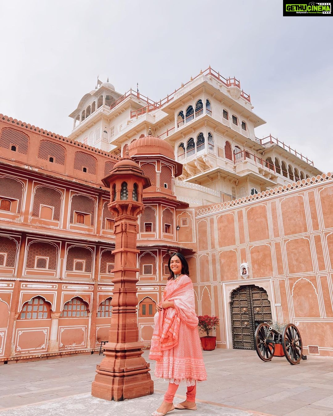 Anupama Gowda Instagram - Jaipur 🌸 1. City palace Every inch of this palace is mesmerising 💓 Love it Love it Love it ! Made of red and pink sandstone , antique artwork and intricate details. To this day, City palace is home to the present royal family of Jaipur. I took City palace Royal tour (3,000/- per person ) where I got the access to visit the upper floors of Chandra Mahal with private guide and in the end complimentary Chai with cookies. 1st floor - Maharaja Sawai Man Singh || Museum. 2nd floor - Sukh Niwas / Blue room. 3rd and 4th floors - Mirror Room and Shobha Niwas. 2. Patrika Gate One of the beautiful locations of Jaipur,it was built to showcase the architectural and cultural heritage of all the regions of Rajasthan. It will be crowded after 10:30 so plan to visit this place around 9 to get some amazing pictures and to enjoy the view. (No entry fees) #travelwithnu💗 Travelling partner: @zipntrip_travel_solutions PC : My tour guide Mr. Rajvendrisingh 🙏🏻 PS: Who clicks your pictures when you go on a solo?? Well, I shamelessly ask everyone to click my pictures and this time I did click few pictures with them too , so swipe left to see my photographer 🤷🏻♀️ jaipur,rajesthan