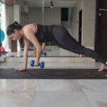 Bhagyashree Instagram - #movementismedicine Not just the plank ! Work on your core, your stability, your balance and your strength. Doing the high plank and shifting the 5kg weight from one side to the other with minimal movement of the hips requires a tight core for stability. Picking the weight requires strength, to keep the tripod requires balance. Do this exercise to benefit in all 3 departments. #workoutmotivation #workout #plank #core #strength #balance #stabilitytraining #workoutathome