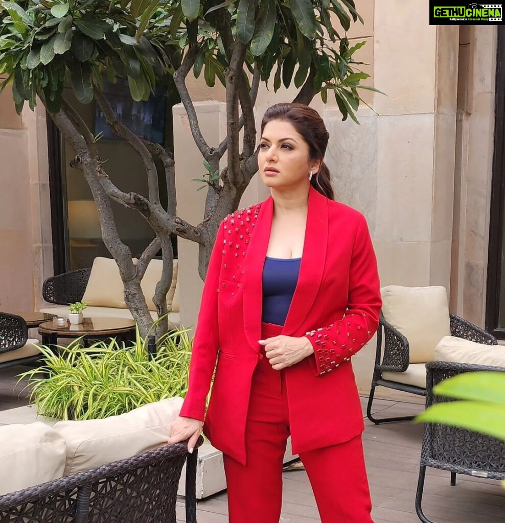 Bhagyashree Instagram - The power of Red ! Colors set the stage, uplift your mood and attract energies. Make sure you pick the right one. Makeup- @elvismakeupartist Hair- @farahkadkotra_hairmakeup Stylist- @roshni0819 Outfit - @shop.bythebay Jewellery - @anaqajewels Footwear - @pabishfootwears Location- @radissonblu #red #photoshoot #powerdressing