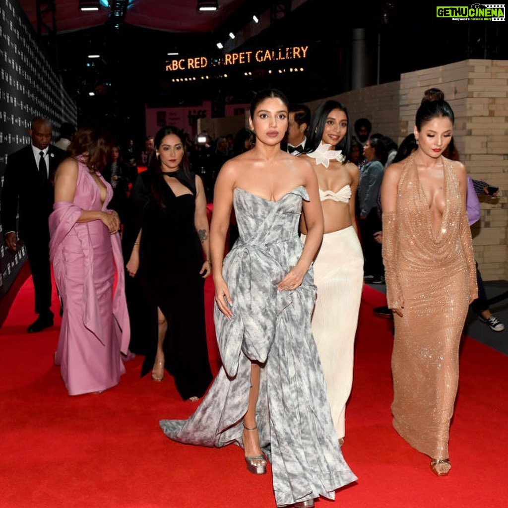 Bhumi Pednekar Instagram - You made me cry 🥹❤️ Thank you Toronto for the love. You’ve given me memories for a lifetime. What happened at the red carpet and screening is something I’ll never forget ❤️ Thank you @tiff_net @cameronpbailey and the jury for selecting our film. This has been such a wonderful experience. We have begun with a bang. Can’t wait to experience this back home ❤️ Outfit - @toni_maticevski Jewellery - @amrapalijewels Shoes - @renecaovilla Makeup - @maccosmeticscanada, @maccosmeticsindia Hair - @connorlangehair @balajimotionpictures @akfcnetwork #ThankYouForComingAtTIFF #TYFCAtTIFF TIFF Production: @Mediaworkss TIFF BTS: Photography & Video: @amritaroraphotography Styled by - @manishamelwani @devanshi.15 @abhilashatd Styling Team - @sim.ran_awayy @junni.khyriem @iambidipto_ @gypsy.girl.world @kasliwalriddhi @bhavnaaaaa.r @swityshinde @juhi.melwani @shubhangi.upadhyay2
