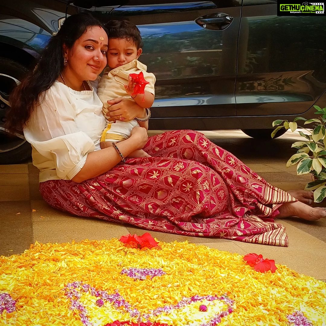 Chandra Lakshman Instagram - ..with the pookkalam of my life..💫😘 @tosh.christy 💕 #ayaan #momandson #onamvibes #festivity Kochi, India