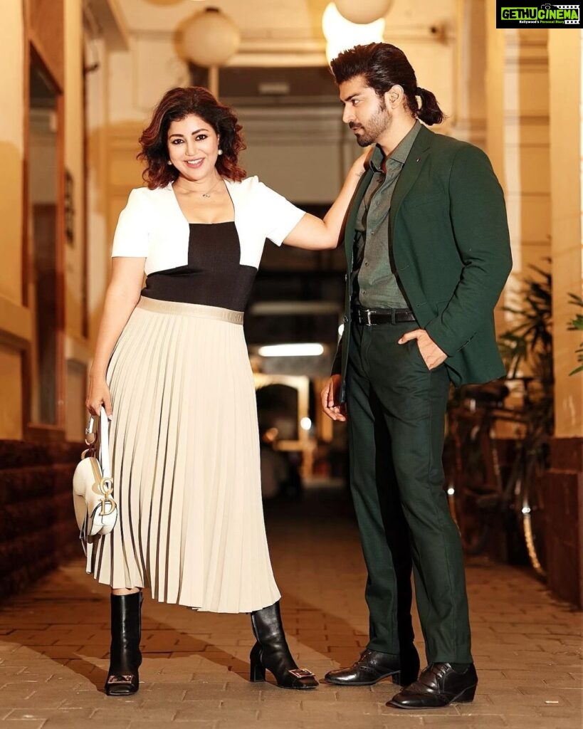 Debina Bonnerjee Instagram - The last one is our wholesome mood 😂🫶🏻😛 #swipe . Black and White Outfit - @calvinklein Pleated skirt - @tommyhilfiger Bag - @dior Shoes - @versace Gurmeet’s Outfit - Monochrome blazer, shirt and trousers - @tommyhilfiger Fashion Directed by: @thebongmunda 📸 : @sk_.click Managed by : @jeevitaoberoi