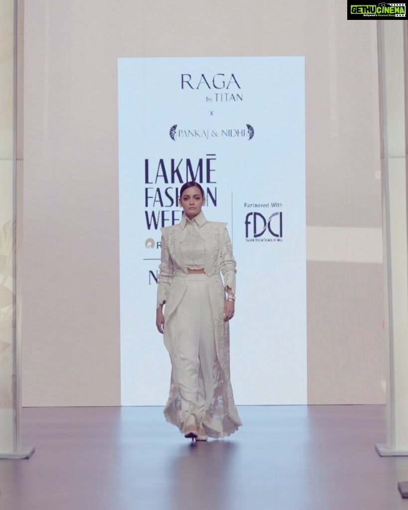 Dia Mirza Instagram - Proud to have walked for Raga by Titan X Pankaj and Nidhi at Lakme Fashion Week in partnership with FDCI. Heartiest congratulations to the designer duo for the completion of 15 years at fashion week and to Raga by Titan for their debut show at Lakme Fashion Week. The stunning ivory ensemble, from the XV collection paired with the exquisite watch from Raga by Titan’s Power Pearls collection, embodied grace and resilience, akin to modern woman 💖🕊 #TitanRaga #RagaByTitan #Raga #RagaWatches #WomensWatches @lovemyraga @pankajandnidhi @lakmefashionwk @fdciofficial #ThrowbackThursday Hair and Make Up by Team @diva_rose21 @karanrai001 @kiran_chhetri92