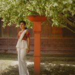 Esther Anil Instagram - Onam vanallo… 🌸 Designed and styled : @amritha_lakshmi___ @styledby_al_ Photography : @merin__georg Mua : @sreegeshvasan_makeupartist Costume : @kritilabel Accesories : @goodwillcollectionskerala Location : @kondai_lip_resort Special thanks : @book_vacations