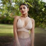 Esther Anil Instagram - 🪷🪷🪷🪷 _________________________ Styling : @amritha_lakshmi___ @styledby_al_ Photography : @merin__georg Make up and hair: @sreegeshvasan_makeupartist Costume : @thehouseofkemp Accesories : @goodwillcollectionskerala Earcuff : @beadsart_hairvine Location : @kondai_lip_resort Special thanks : @book_vacations