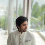 Gourab Roy Choudhary Instagram - The Mehendi Mishap Raj was known to be quite the serious guy in his neighborhood. People would often joke that the last time Raj laughed, dinosaurs roamed the Earth. But little did they know, Raj had one peculiar trigger that always got him - the song "Mehendi Laga Ke Rakhna" from the movie 'Dilwale Dulhania Le Jayenge'. One sunny afternoon, as he was strolling through the market, the unmistakable tune started playing from a nearby speaker. Without warning, Raj erupted into a fit of laughter. Shopkeepers paused, children looked up from their games, and an old cat, startled, bolted away. The entire market turned their heads to witness this rare spectacle. Hours later, still reeling from his uncharacteristic outburst, Raj decided to sit down at a park. He pondered over his inexplicable reaction. "Why does that song tickle me so?!" he thought. As he was lost in thought, an elderly woman with sparkling eyes and a mischievous grin approached him. "I saw what happened at the market," she said, chuckling. Raj looked up, sheepishly, "Oh, did you now?" She winked, "It's okay to laugh. But remember, everyone has to apply 'mehendi' someday. Be ready for the 'shadi ka laddu'!" She laughed heartily, her laughter echoing around the park. Raj was taken aback but then burst out laughing once again, realizing the humor in the situation. From that day on, he was known not only as the serious guy but also as the guy who laughed at the most unexpected moments. And every time "Mehendi Laga Ke Rakhna" played, the neighborhood would smirk in unison, eagerly waiting for Raj's reaction. Gourab Roy Chowdhury