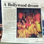 Hazel Keech Instagram – Serious throwback here to my life as a professional dancer, i am centre left, with the bangs and a cheesy grin with @sheeralid kneeling in front of me. This might have been  2003/2004. Heres a newspaper clipping of our dance troupe after being selected to be part of Bombay Dreams the musical post gruelling auditions. This was the most fun and toughest performance i had done, the energy of this routine so high throughout and we had to cheat moments to catch a breath. It pushed me to become an artist who perform my best each time, whether during rehearsals or during a show. Ive had some amazing experiences through my career as a dancer/singer/model/actress/comedian so I’ve decided to start to share them with you all.