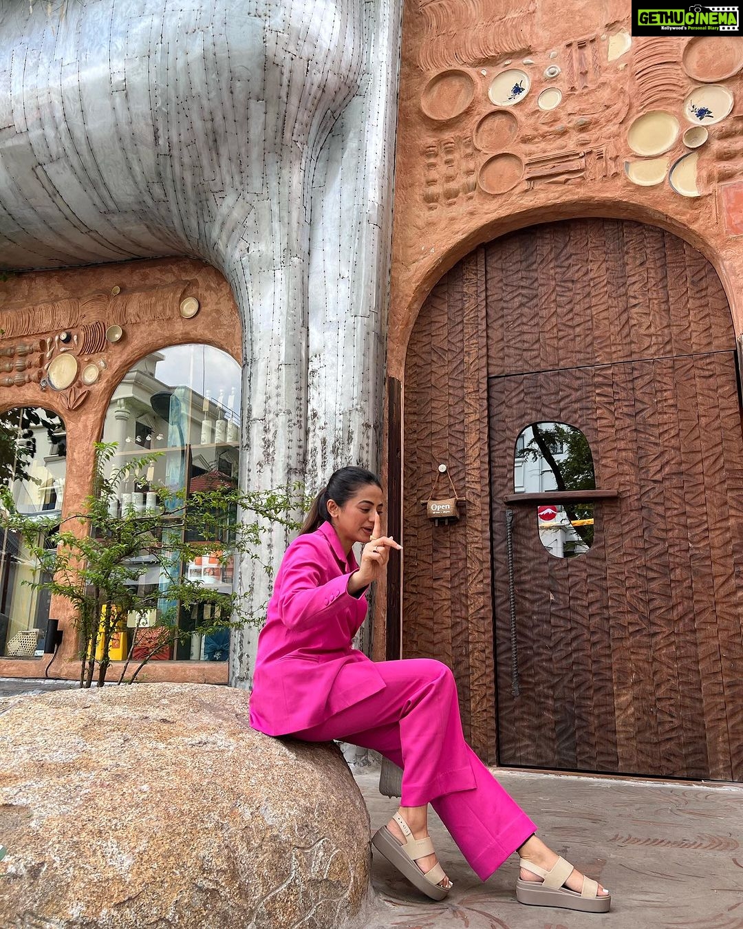Helly Shah Instagram - Well , If you aren’t crocin’ you aren’t rocking 🙃🌟 Wore this perfect hot pink pant suit by @saltattire in Vietnam and couldn’t help but pair it with my most fav crocs ✨🌝 Outfit: @saltattire Styling: @styling.your.soul
