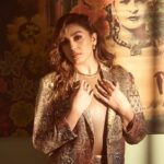 Huma Qureshi Instagram - Let Art inspire Life … what else is there in the mundane anyway .. haina.. #goldengirl #mood #love Outfit: @eizabykaaj All jewellery: @e3kjewelry @ascend.rohank Bodysuit: @skims Shoes: @louboutinworld Styled by: @dhruvadityadave Hair by: @nargis9052 Make up by: @ritikavatsmakeupandhair Shot by: @gohil_jeet Nails @itssoezi