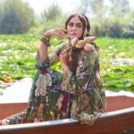 Huma Qureshi Instagram - “There can be no art in the absence of courage”, says Huma Qureshi, as she shoots for us on a bright morning in the spellbinding Dal Lake. The actor was in Srinagar, Kashmir, to be the showstopper for couturier Varun Bahl’s historic fashion show – the first ever mainstream showcase in the valley in the last forty years. Models from Srinagar and neighbouring areas participated spiritedly in the show. Two years ago, a fashion show held by locals in the valley had irked the radicals. They had taken out a protest march against the organisers. Bahl’s grand show turned out to be far cry – shutting down naysayers, it proved how fashion – a celebration of free will and individual liberty, can also become a means to counter extremism. It marked the fearless return of art and fashion in the Valley. Happy to see her mother’s homeland bounce back after a long period of gloom, Qureshi says fashion can serve as a powerful unifier. “Fashion can help find beauty and harmony even when it’s difficult to do so. It can bind people across the world. Fashion is liberating and should be allowed to flourish,” says Qureshi. Qureshi played the perfect muse for us as she posed for her first ever fashion shoot in Kashmir, celebrating wedding wear rooted in traditions. “Every bride looks resplendent irrespective of which part of India she is from. Whether it is a sari, a lehenga or a sharara —- Indian wedding couture has a special place in my heart. Its beauty is unmatched,” says Qureshi, who looks like a dream herself in Bahl’s splendid creations. Concept & Creative Direction: @sharaashraf Outfits: @varunbahlcouture Styling: @gopalikavirmani Photos: @lakshaysachdevaphotography jewellery: @thehouseoframbhajos coordination: @kayanaaaaat production: Irshu (@euphoriatravelservices )
