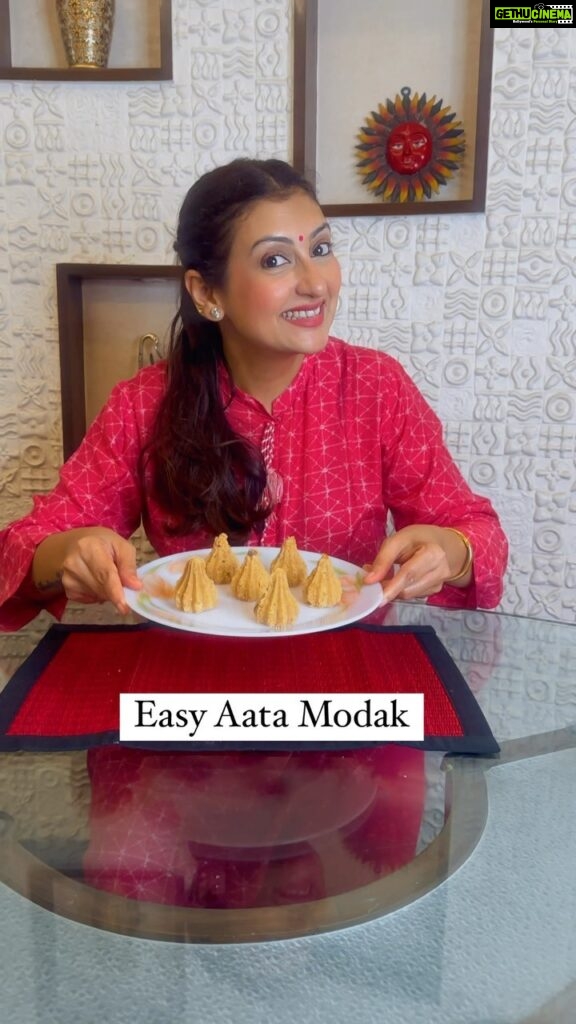 Juhi Parmar Instagram - Welcoming Bappa home is our most favourite time of the year and with Him come the happiness, celebrations and lots and lots of sweets, his favourite Modaks! Making a simple and easy recipe and this time it’s a simple atta modak! Sharing the recipe below, try it out yourself! Ingredients- 1/2 cup ghee 1 cup wheat flour Mixed dry fruits of your choice 1/2 cup jaggery 1-2 tsp milk 1 pinch cardamom powder (optional) Method- Heat ghee, add wheat flour.. Cook till it turns brown. Add dry fruits and mix well.. Add jaggery and cook till it is mixed properly. Add milk.. Add 1 pinch cardamom powder (optional) Take it off the flame.. let it cool a bit. Make modak using a mould or with hands . #modak #modakrecipe #ganpati #ganpati2023 #ganpatiwithparmars #ganpationreels #attamodak #reels #reel #reelsvideo