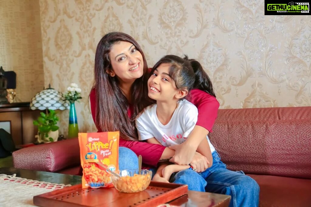 Juhi Parmar Instagram - Making time for my precious Samairra is always a priority, whether it's cooking, reading, or enjoying a movie night. YiPPee! Pasta is the perfect snack for our special bonding time. Made with suji and no maida, it's a healthy snack I trust. It's not fried and has tasty corn too! YiPPee! Pasta is our family's favorite snack. Create beautiful memories with your child and enjoy YiPPee! Pasta together. 🍜 @sunfeast_yippee