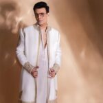 Karan Johar Instagram - The festivities begin…. Styled by @ekalakhani in @toraniofficial 📷 @maajidkhan88