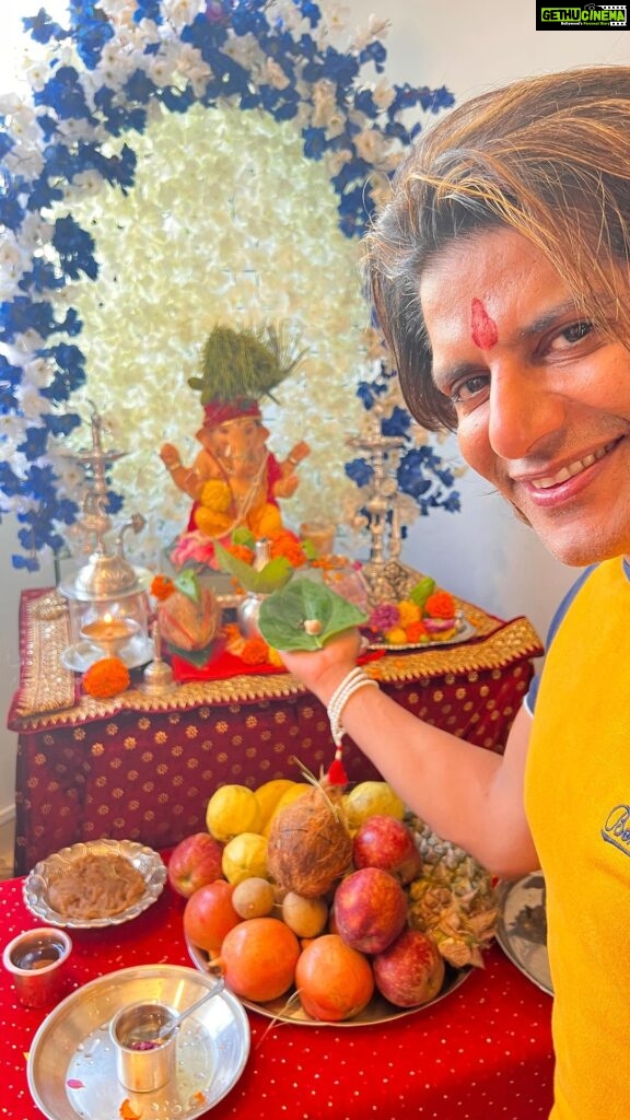 Karanvir Bohra Instagram - When they ask me what does #ganesha mean to you? in one word #nostalgia ….. it’s been 42 years that we have been keeping him in our home, sometimes 10 days some times 5…. But in our hearts forever. My children @twinbabydiaries @thebabysnowflake will miss the ganesha festival this year and he is their favourite… they love making the idol with me in clay, so this time i got an #ecofriendly #ganpati in their abscence #ganpatibappamorya Also 👇🏼👇🏼👇🏼👇🏼👇🏼👇🏼👇🏼👇🏼👇🏼👇🏼 P.S : people, pls try and not immerse the flowers and Fritos in the sea, save #mothernature be conscious of our #environment don’t hurt her and keep the #oceansclean