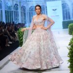Karisma Kapoor Instagram - Embracing the beauty of change with Lashkaraa’s Garden of Serenity 🦋🌸 - the brand’s first ever bridal collection. Had a blast walking the ramp at BTFW in this exquisite hand embroidered lehenga by Lashkaraa. @lashkaraa @timesfashionweek #BTFW’22