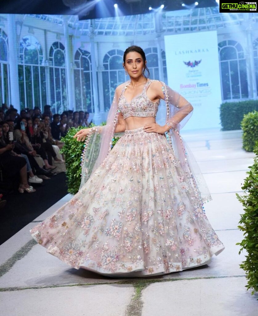 Karisma Kapoor Instagram - Embracing the beauty of change with Lashkaraa’s Garden of Serenity 🦋🌸 - the brand’s first ever bridal collection. Had a blast walking the ramp at BTFW in this exquisite hand embroidered lehenga by Lashkaraa. @lashkaraa @timesfashionweek #BTFW’22