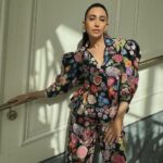 Karisma Kapoor Instagram - Stay wild, Flower child 🖤🌸 Suit - @rahulmishra_7 Jewellery - @studio.metallurgy Styled by - @stylebyami HmU - @kritikagill Managed by - @nasrindsouza #dubaidiaries #workingweekend