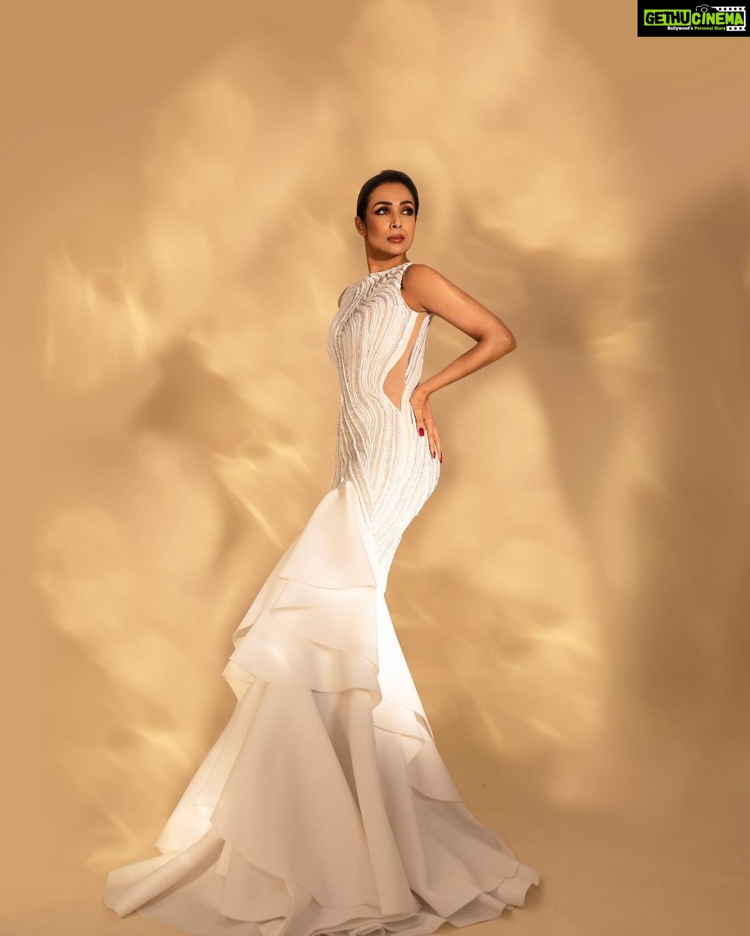 Malaika Arora Instagram - Sunday🤍🤍. Gown by : @gauravguptaofficial Styled by :@manekaharisinghani Makeup by : @simone.hairandmakeup Hair by : @hairstylist_madhav2.0 Shot by : @apoorvmauryaphotography