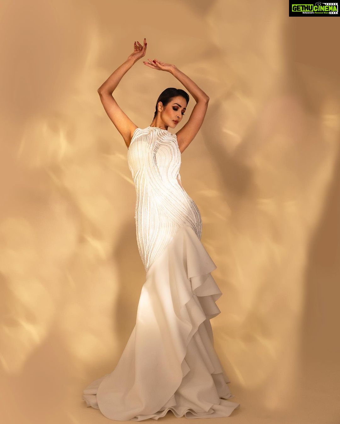 Malaika Arora Instagram - Sunday🤍🤍. Gown by : @gauravguptaofficial Styled by :@manekaharisinghani Makeup by : @simone.hairandmakeup Hair by : @hairstylist_madhav2.0 Shot by : @apoorvmauryaphotography