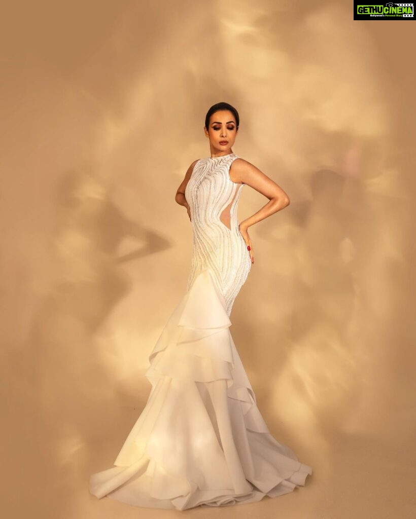 Malaika Arora Instagram - Sunday🤍🤍. Gown by : @gauravguptaofficial Styled by :@manekaharisinghani Makeup by : @simone.hairandmakeup Hair by : @hairstylist_madhav2.0 Shot by : @apoorvmauryaphotography