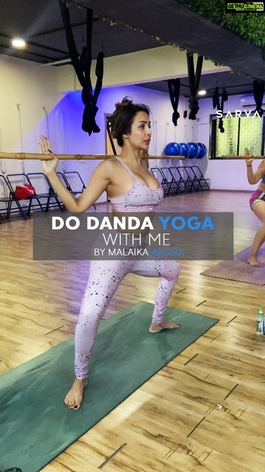 Malaika Arora Instagram - Good morning everyone, I'm back with a fantastic Monday workout. This time with a prop. ❤️ Danda yoga is one of my favourite forms of yoga. Here are some reasons why: - It's a fabulous workout to reduce belly fat, especially the around your waist. - It gives a great stretch to the muscles of the arms and legs and spine - It relaxes the body thoroughly. This week, try adding a prop to your workout, something as simple as a bottle of water or a towel. It will enhance your workout and give you a welcomed break. #malaikasmoveoftheweek #malaikasmondaymotivation #mondaymotivation #yoga #workout #dandayoga #bellyfat #stretch #yogasana #yogaposes #yogaforeveryone #yogainstructor #fitness #fitnessmotivation #instayogi #yogigram #yogi #transformationjourney #reels #trendingreels #explorepage