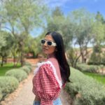 Malavika Mohanan Instagram – In in a very rainy mumbai at the moment, and reminiscing about this lovely afternoon I spent in the High Atlas hills of Morocco. There was brisk mountain air, the most orangey oranges I’ve seen & the cutest little doggo for company 🐶 As you can evidently guess, it was a good day ♥️

Also, wearing the cutest little top by @springorigin which designs the cutest stuff everrrrr
How you do this @apurvanayal howw 🤍