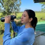 Manvita Kamath Instagram - #kaziranga forest safari in my pajamas!!! Well, in the hustle bustle of packing my bags I either overly pack or under pack my stuffs!! I had to pay extra for the 8 kg excessive baggage yet forgot to carry pants for my safari ..hence managed to wear my blue teddy bear pajamas that eventually went well with my sweatshirts!! 😅 Also was completely fed up of looking for Bengal tigers in the safari… all I could get was glimpses of elephants and rhinos even though my chauffeur was enthusiastically make me figure something or the other out.. woh dekho madam … wohhhh raha..wahiiii…. Usss paudhe ke beeeeechhhh… I would just zoooom and zooommmmm and could hardly find anything 😅😅 butttt, my binooo definitely found some rhino!!! 🦏🦏🦏 Well, that’s my safari story.. what’s yours ? 😊 . #pajamas #pajamastory #iykyk #instagram #forestsafari #kaziranga #assam #instagood