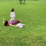 Neha Dhupia Instagram - Jus these two ♥️♥️ rolling around in the grass … and being blessed by #dada #daadi … our #simplesummer 🏠♥️ 🧿