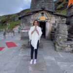 Nia Sharma Instagram - Took a flight.. 9 hours of drive…got stuck in landslides.. mountain trekk for hours and then you make it to Tungnath.. The “Highest Shiva temple in the world”. And further up to Chadrashila ( if you’re still alive😝) But everything seems worth it once you stand there! Chanting HAR HAR MAHADEV !! Special thanks to @vibhakaulbhat @sbsabpnews for the most amazing trip👏🫶 #SBS20 Tungareshwar Mahadev Temple