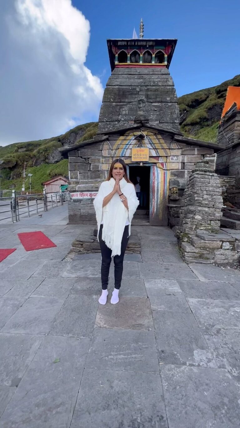 Nia Sharma Instagram - Took a flight.. 9 hours of drive…got stuck in landslides.. mountain trekk for hours and then you make it to Tungnath.. The “Highest Shiva temple in the world”. And further up to Chadrashila ( if you’re still alive😝) But everything seems worth it once you stand there! Chanting HAR HAR MAHADEV !! Special thanks to @vibhakaulbhat @sbsabpnews for the most amazing trip👏🫶 #SBS20 Tungareshwar Mahadev Temple