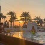 Nia Sharma Instagram - The pool party… pina coladas.. the sunset.. my day’s made. #dubai🇦🇪 @fivepalmjumeirah also thanks for putting up the best cocktail show for me🥳💯 Rima❤️ FIVE Palm Jumeirah Dubai