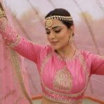 Nisha Agarwal Instagram - Draped in hues of elegance and grace, embracing this timeless beauty. 🌸💖💫 This desi barbie core lehenga from @sheetalbatra definitely deserved some love & Camera ! Wearing @sheetalbatra @apostrophe.communications Jewels @shopravyaa @vblitzcommunications #IndianCouture #PinkPerfection #RegalElegance #indianwedding #indianwear #indianfestival #indianfestivewear