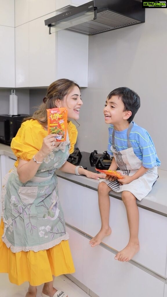 Nisha Agarwal Instagram - When boredom strikes, it’s time for a tasty twist! Ishaan is usually glued to his iPad, but when hunger strikes, we put on our aprons and dive into the kitchen, ready to create a yummy surprise. With YiPPee! Pasta, excitement fills the air! It is made from Suji and is a perfect combination of health and taste. It has no maida, not fried, and it’s packed with veggies! It’s a treat that even I couldn’t resist taking a bite of. 😉 If you’re on the hunt for a quick and tasty snack for your little ones, give YiPPee! Pasta a try! 😋👦👩‍🍳 @sunfeast_yippee