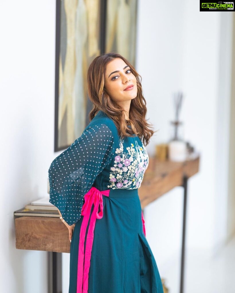 Nisha Agarwal Instagram - Embracing life's moments, like a breath of fresh air. Wearing @madzinlabel