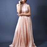 Nisha Bano Instagram – Dusty rose high neck low length flared culle sleeveless with pleats gown
Place your orders now