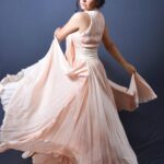 Nisha Bano Instagram – Dusty rose high neck low length flared culle sleeveless with pleats gown
Place your orders now