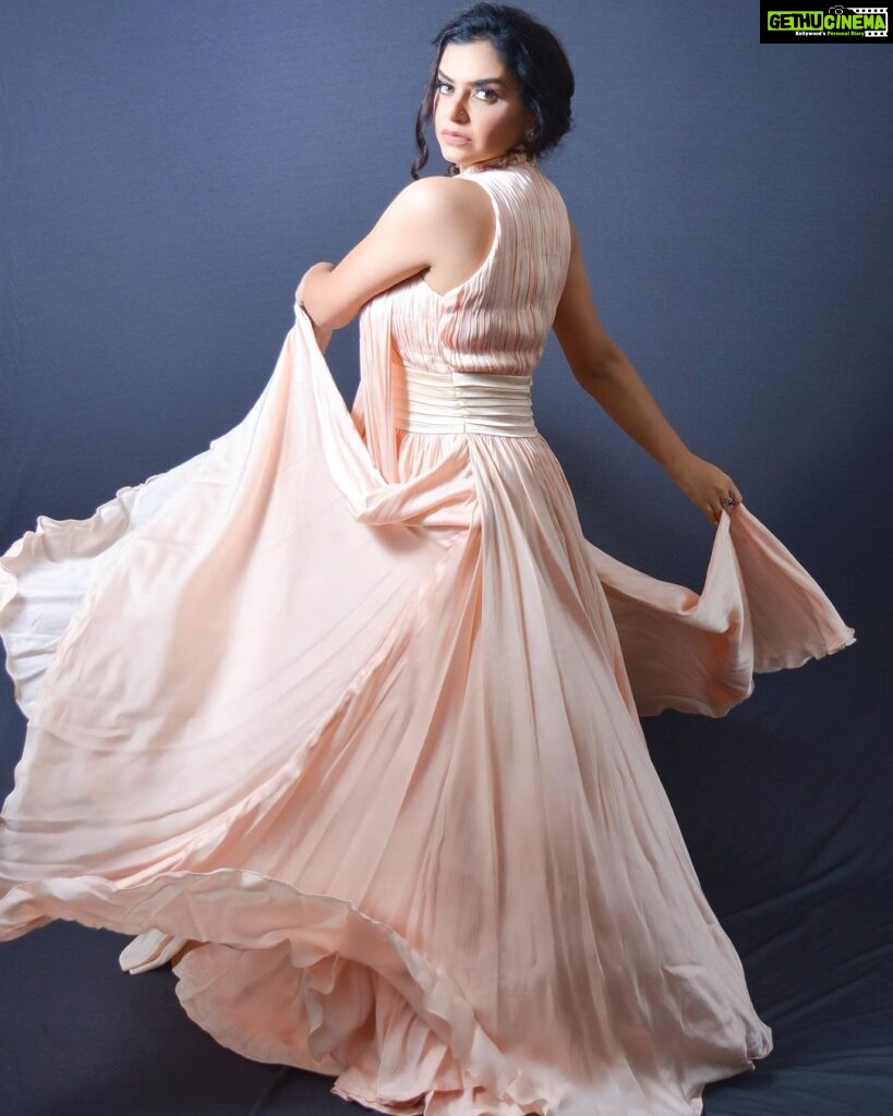 Nisha Bano Instagram - Dusty rose high neck low length flared culle sleeveless with pleats gown Place your orders now