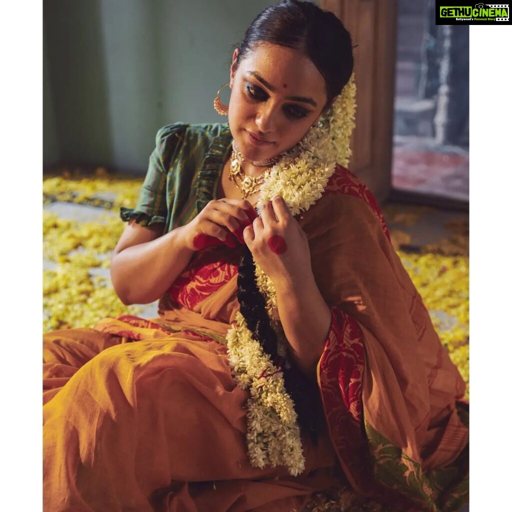 Nithya Menen Instagram - Chitrangada', a dance drama, originally composed by Nobel laureate Gurudeb Rabindranath Tagore in 1892, is based on the love life of Manipur's princess Chitrangada and Arjuna, the third Pandava of the epic Mahabharata. It documents the emotional journey of Chitrangada as she is awakened by her irresistible love. Reimagine is an attempt to create a fresh look and feel for the characters, and spinning a new story out of them. But all are re-interpretations with an intriguing approach while retaining the visual essence of the original works. This one particularly is a tribute to all girls who grew up in Bengal, and dance classes were an integral part of their life. The little girls participated in Rabindrajayanti celebrations in the locality where Tagore’s dance dramas were performed. Creative direction and styling, make up done by @rishabhad Clothes @parama_g Photography @sauvicksengupta
