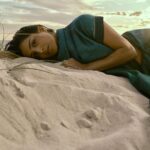 Pallavi Sharda Instagram – Sitting on the Meridian which holds the cusp of my ancestral past and futures, two cultures, two continents – wrapped in a sari I found in my mother’s closet that afternoon. 

Shot by @mauro_palmieri_photographer on the dunes of City Beach in WA on the sacred land of the Nyoongar people, on the Ocean my parents traversed to call this great southern land home. 
Sometimes the liminality of this land digs deeper than words can express. 

Yesterday was #nationalhandloomday. A moment – amongst many –  to celebrate the artisans who weave the threads that envelope us in our histories.

HMU @nadiaduca 
Camera Assist: @chrismartinstudio
Sari: mama’s 
Jewels: @miromirostudio Indian Ocean