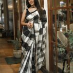 Paoli Dam Instagram - Styled by @poulami.rgupta Saree @vilasabengal Jewellery @doribymeghnamaniar Makeup @makeupartist_sourav Hair @shyamali.das.7583 Photographed by @avipal_official . . . . . #ethnicwear #white&black #sareelover #portraits #photographs #portraitphotography #instafit ##instagood #instacarousel #paolidam #paolidamofficial