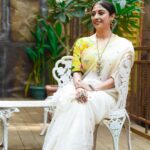 Paoli Dam Instagram - 💛🤍 Styling by @poulami.rgupta Jewellery by @dazzlingdanglersbyruchi Blouse by @sayantighoshdesignerstudio Makeup by @makeupartist_sourav Hair by @shyamali.das.7583 . Photographed by @avipal_official . . . #yellow #white #sareelove #instagram #carouselpost #instafit #postoftheday #potd #pujolook #outfitoftheday #lookoftheday #instarepost #paolidam #paolidamofficial