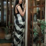 Paoli Dam Instagram - Styled by @poulami.rgupta Saree @vilasabengal Jewellery @doribymeghnamaniar Makeup @makeupartist_sourav Hair @shyamali.das.7583 Photographed by @avipal_official . . . . . #ethnicwear #white&black #sareelover #portraits #photographs #portraitphotography #instafit ##instagood #instacarousel #paolidam #paolidamofficial
