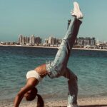 Pooja Bhalekar Instagram - Changing the perspective to look at the world 🦋 . . . . #yoga #yogagirl #flexibility #martialartist #discipline #yogalove #practice #beachyoga