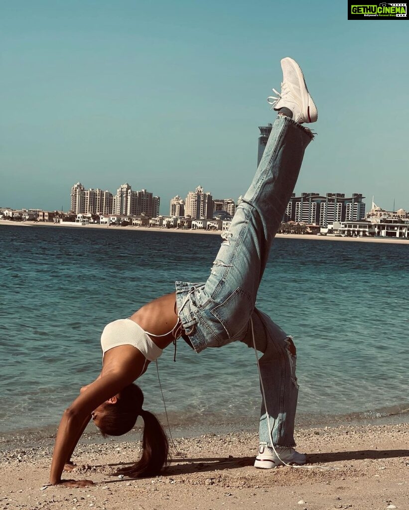 Pooja Bhalekar Instagram - Changing the perspective to look at the world 🦋 . . . . #yoga #yogagirl #flexibility #martialartist #discipline #yogalove #practice #beachyoga