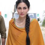 Pooja Chopra Instagram - Still vividly remember the first day of shoot, being ‘Sakina’, so nervous.. actually terrified!! While the happy pictures were literally taken moments after delivering my very first take. I Remember my producer jumped out of his chair with happiness after ‘cut’ n the smile on my directors face was priceless... Jahaan Chaar Yaar has a soul. It’s the one film I genuinely gave my heart to. I’m not sure if I became her or she became me but one thing I know for sure that Sakina will stay with me.. forever 🧡 #extremelyspecial #jahaanchaaryaar in theatres TODAY 🎉 #superEXCITED