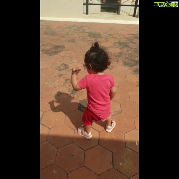 Radhika Pandit Instagram - When Ayra was just learning to walk.. but I guess she got distracted by a friend.. (her shadow) Wonderful thing about kids.. they are kind to everyone/everything, coz they don't judge! 😊 #radhikapandit #nimmaRP