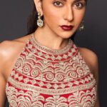 Rakul Preet Singh Instagram - Retro Love by @bhumikasharmaofficial at @lakmefashionwk @fdciofficial Loved playing muse to Bhumika in this signature Bhumika Sharma Red lehenga ensemble, adorned with stunning and intricate embroidery.♥️ Stylist: @divyakdsouza Videography: @sushii018 HMU : @im__sal @aliyashaik28 Jewellery : @daakghar.in Marketing agency : @quirkbrandconsulting #BhumikaSharma #BhumikasSharmaOfficial #Retrolove #rakulpreet #LFW23 #LakméFashionWeek #FDCI #LakmeFashionWeekxFDCI #lfwxfdci