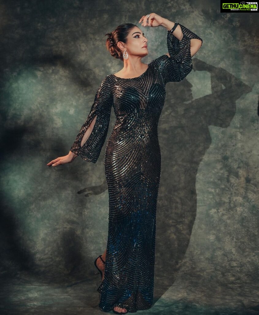 Raveena Tandon Instagram - In the darkness of the night… 🖤 Outfit : @estera_trends Earrings : @thehouseofmbj Rings : @jet_gems Footwear : @monrowshoes @id8mediasolutions Styled by @poojagulabani Glam by @sshurakhan Clicked by @deepak_das_photography Managed by @reemapandit Mumbai, Maharashtra
