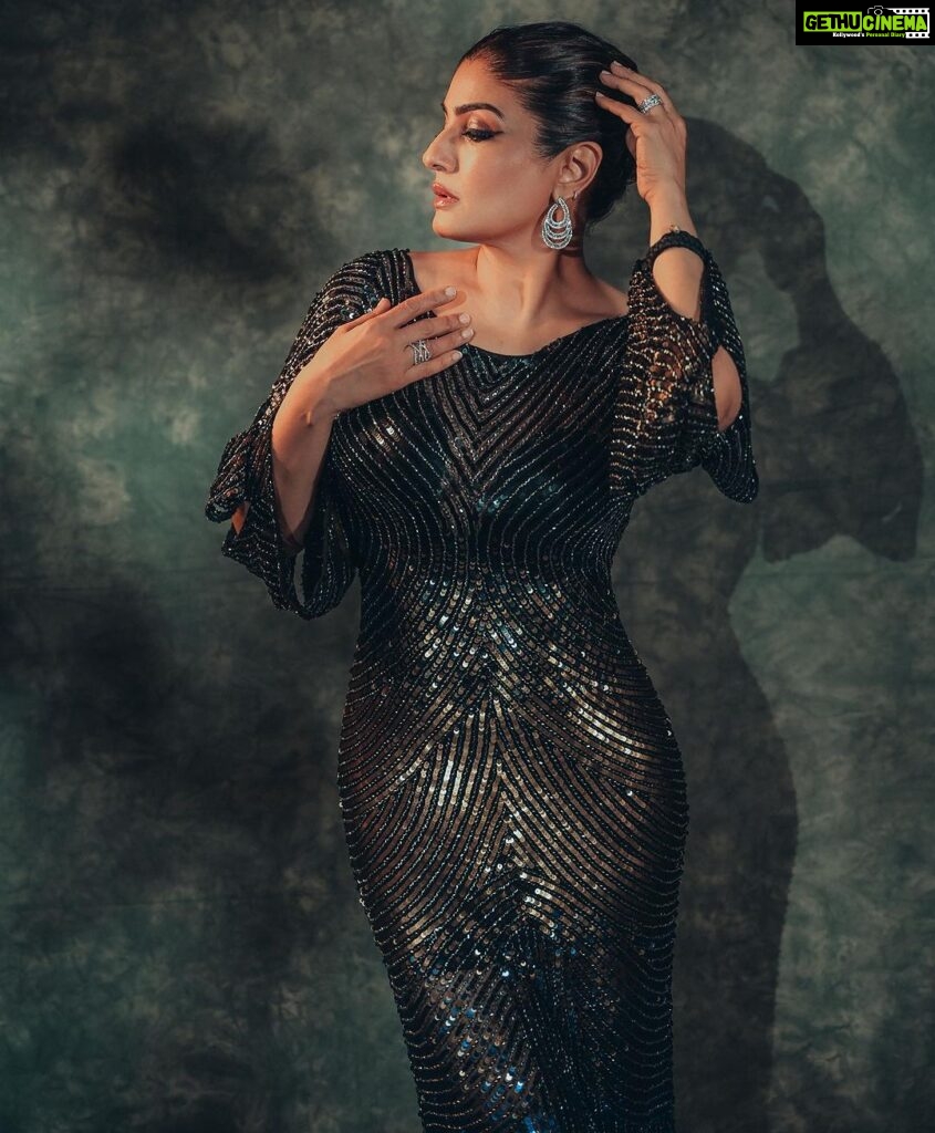 Raveena Tandon Instagram - In the darkness of the night… 🖤 Outfit : @estera_trends Earrings : @thehouseofmbj Rings : @jet_gems Footwear : @monrowshoes @id8mediasolutions Styled by @poojagulabani Glam by @sshurakhan Clicked by @deepak_das_photography Managed by @reemapandit Mumbai, Maharashtra